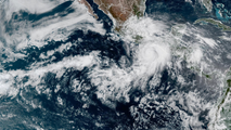 Hurricane Erick strengthens with 100 mph winds as it rapidly intensifies in Eastern Pacific
